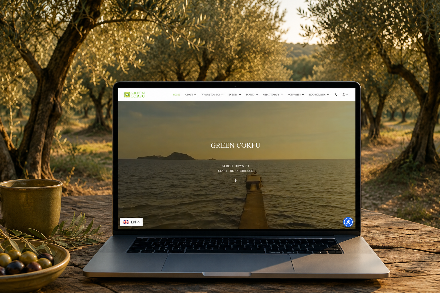 Green Corfu responsive Joomla website displayed on a desktop computer, designed and developed by WA Designs.